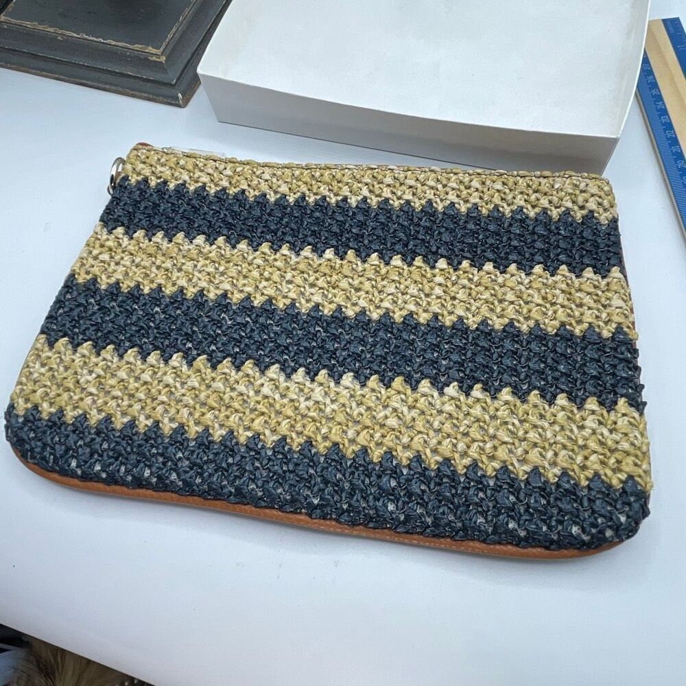 Jewel Thirty-one woven clutch or makeup bag